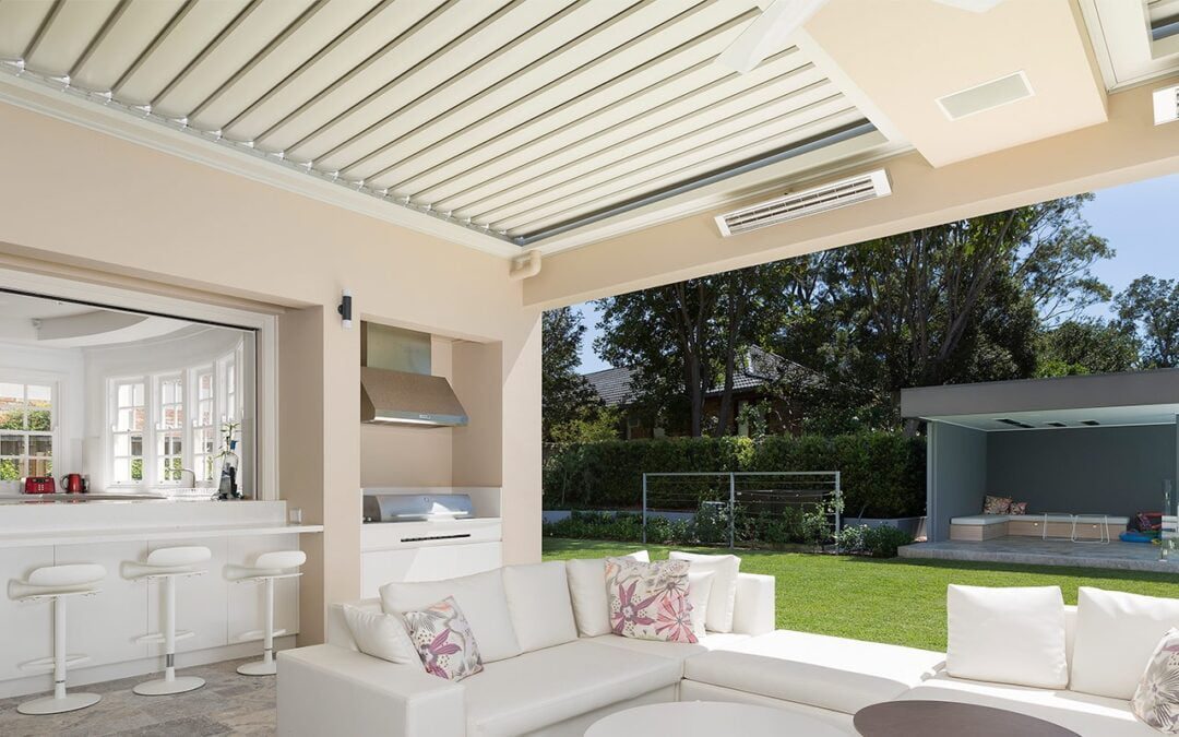 Custom-made pergola, louvered roof, as a kitchen